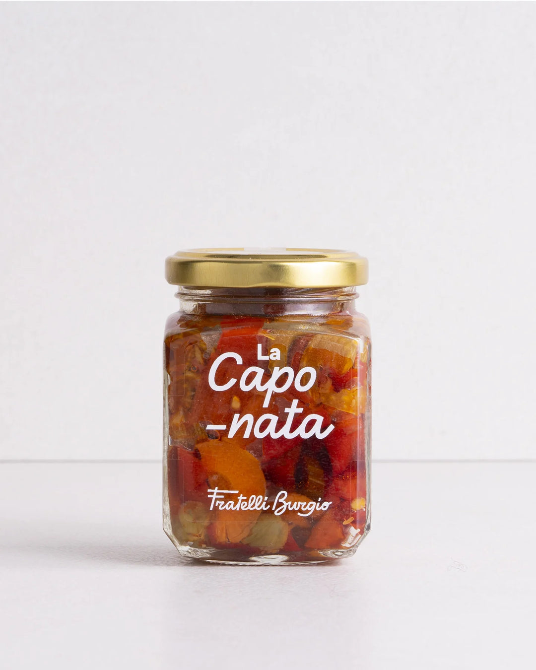 Glas Caponata mit mediterranem Gemüse, goldener Deckel, italienische Delikatesse